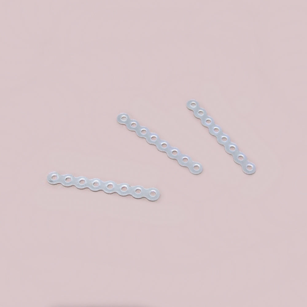 Separador Ondulado 8 Agujeros x 28mm Plateado x 20pcs