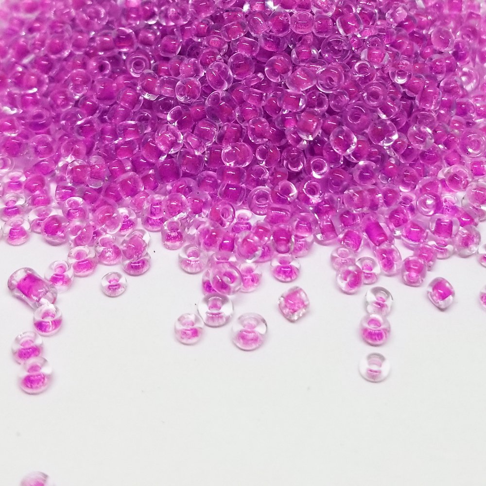 MOSTACILLA TRANSPARENTE FONDO FUCSIA 12/0 139