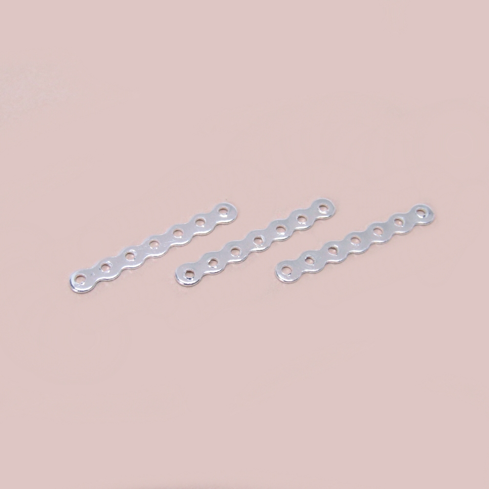 SEPARADOR ONDULADO 7 AGUJEROS *24MM PLATEADO *24PCS