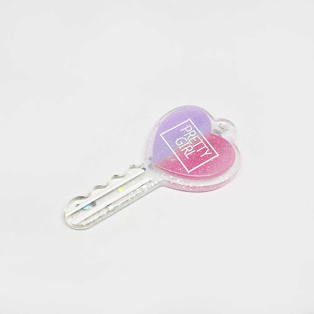 DIJE CORAZON LLAVE-RESINA MULTICOLOR 58*29MM