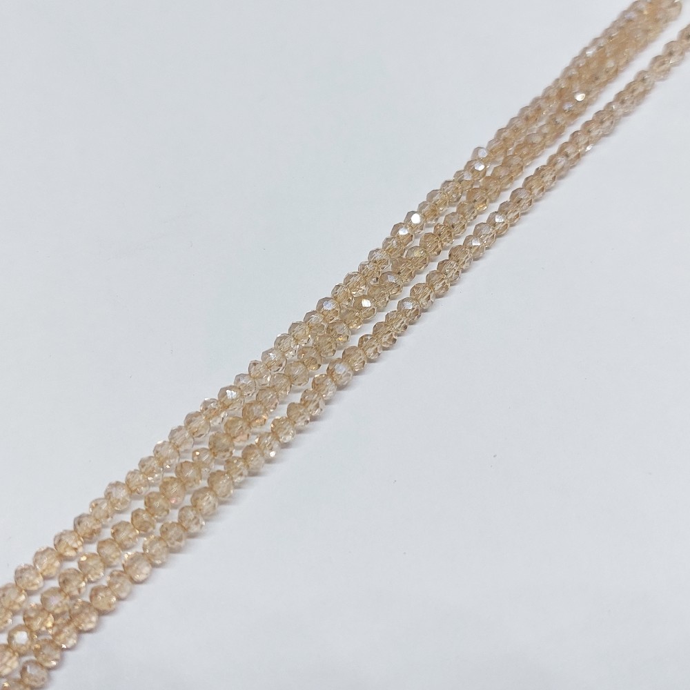 CRISTAL DONA BEIGE TRANSPARENTE TORNASOL 2*3MM